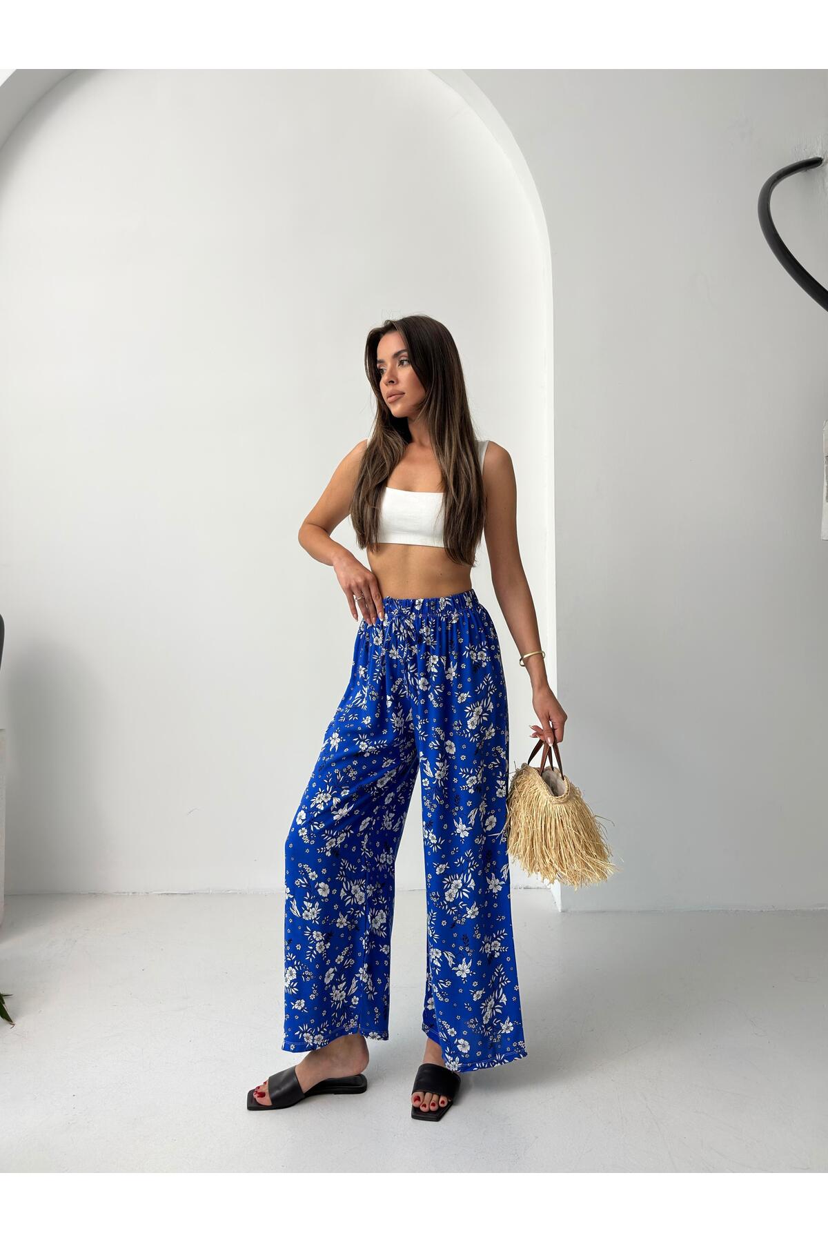 Saks Mavi Büyük Çiçek Desenli Bol Paça Pantolon